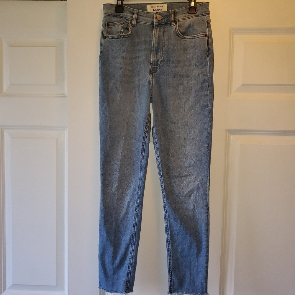 Reformation raw edge skinny jeans.